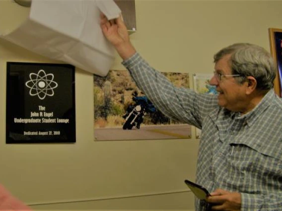 man and plaque