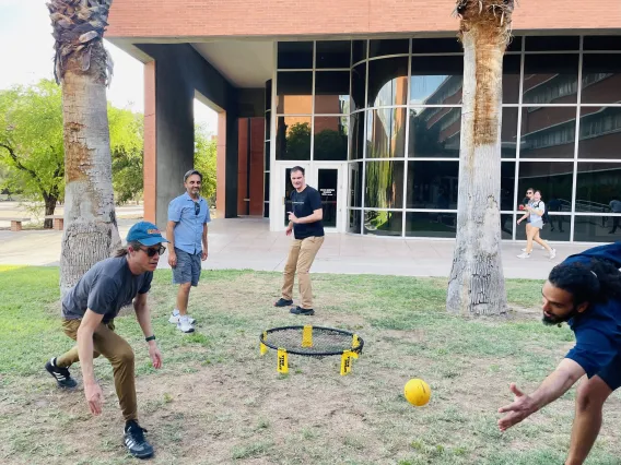 Playing Spikeball at the welcome event