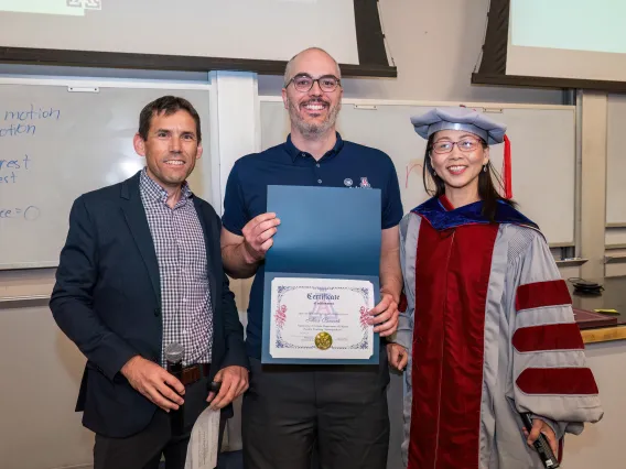 Alex Burant (center) with Brian LeRoy and Shufang Su