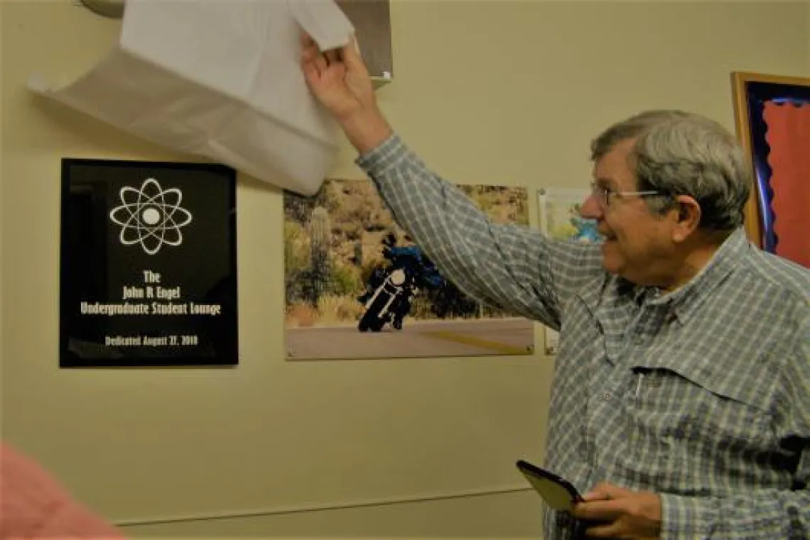 man and plaque