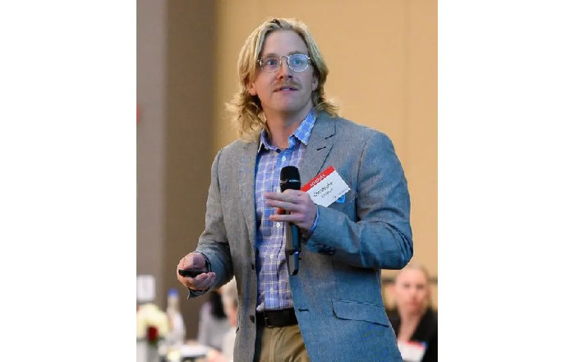 Chris Grayson giving a talk at the CoS Galileo Circle Dinner
