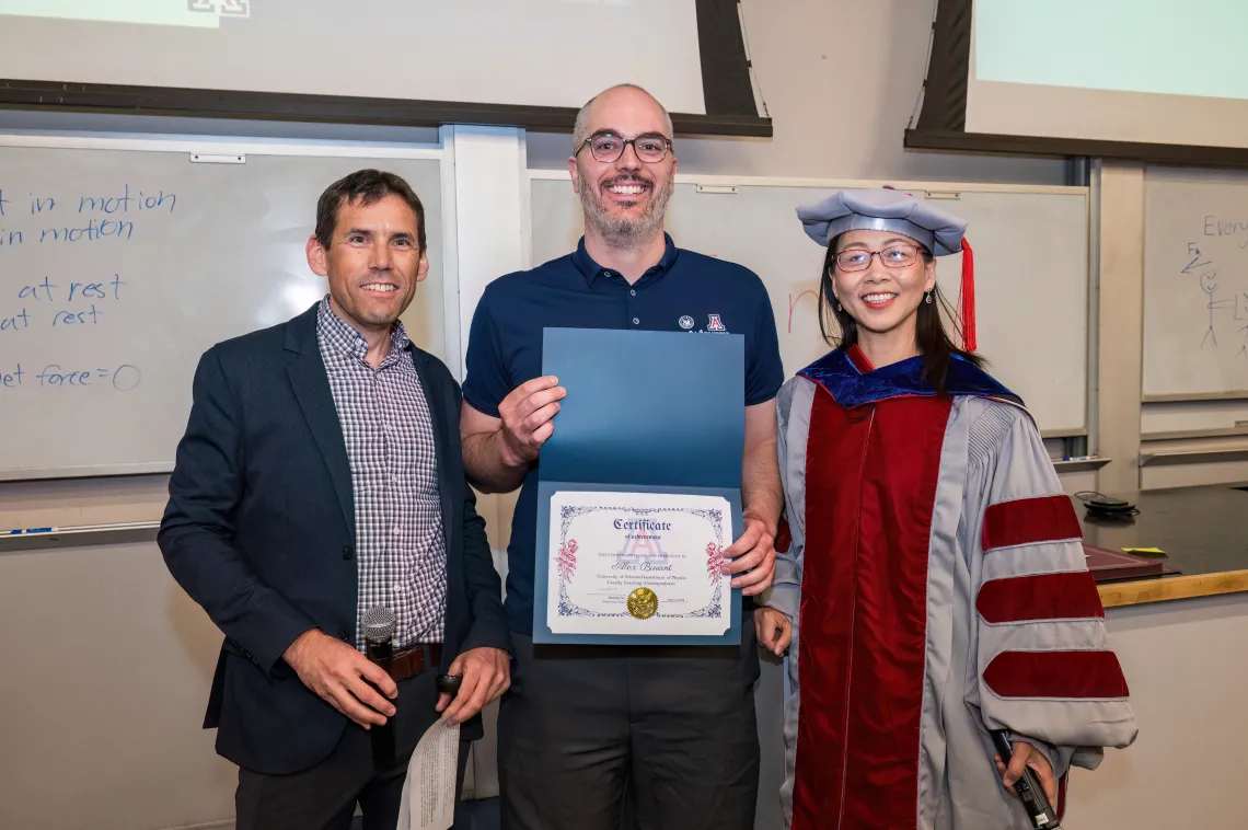 Alex Burant (center) with Brian LeRoy and Shufang Su